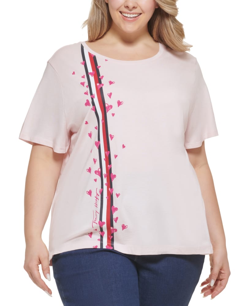 Front of a model wearing a size 1X Tommy Hilfiger Women's Plus Heart Print T-Shirt Pink Size 1X in Pink by Tommy Hilfiger. | dia_product_style_image_id:313726